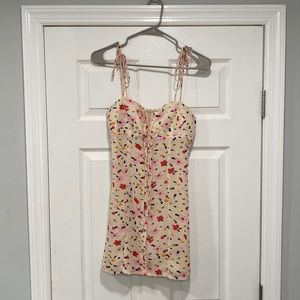 princess polly summer dress. Adjustable tie shoulders. Button detailing on front